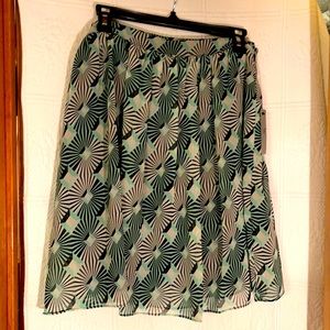 Worthington Blue Diamond above knee skirt. Hemmed and lined in black.